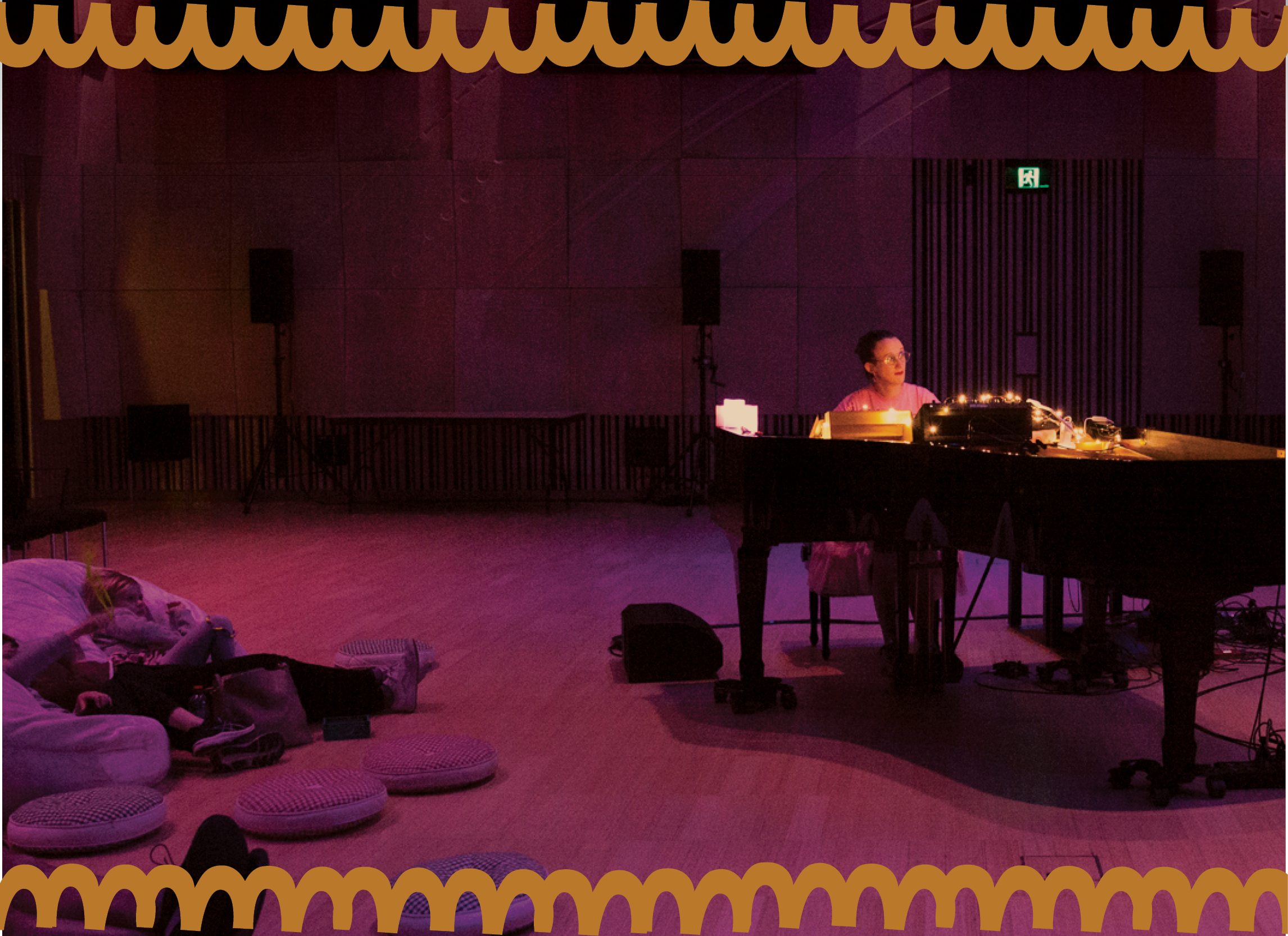 Nat Bartsch playing the piano in a softly lit room.